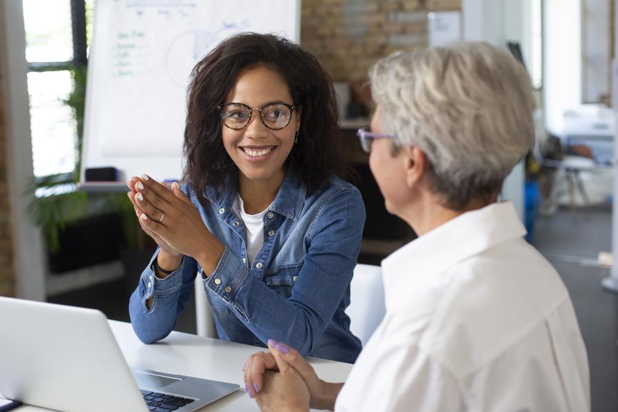 people-using-digital-device-while-meeting